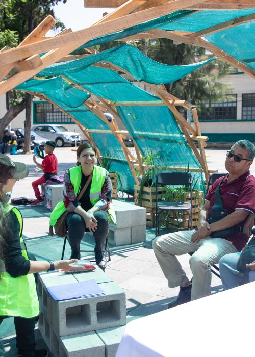 City residents gather to talk under a new shaded shelter