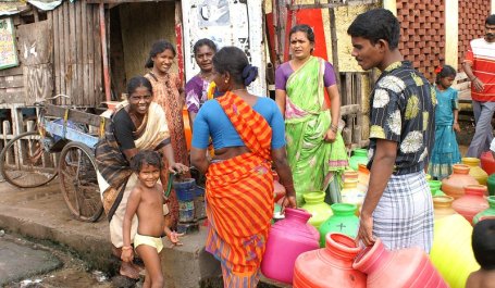 People getting water in India