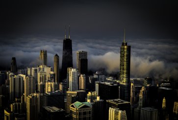 Dark foggy sky above Chicago skyline. 