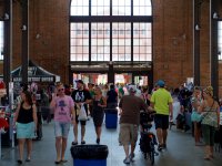 People walk inside Detroit's Eastern Market.