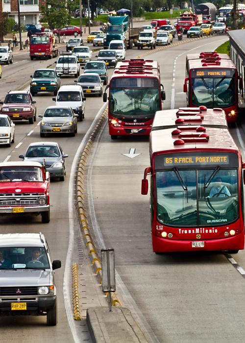 Electric bus on road with cars
