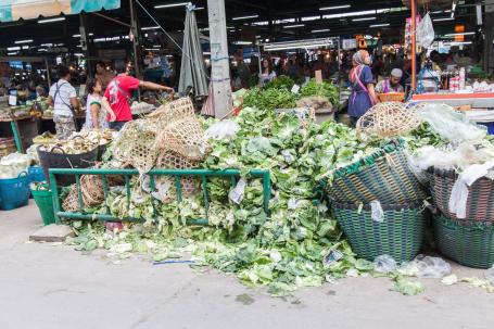 A pile of vegetables thrown away at a food market in Bangkok, Thailand.