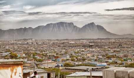 Khayelitsha, an informal settlement in Cape Town, with Table Mountain in the background