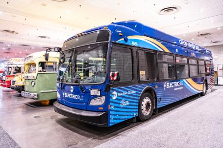 A New Flyer electric bus is on display at the New York auto show.