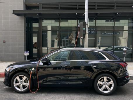 Pole-mounted electric vehicle charging.