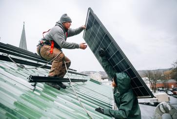 Installing rooftop solar panels in upstate New York