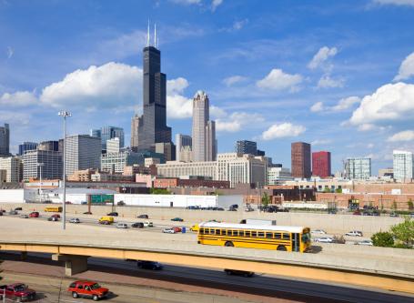 School bus in multi-lane highway in Chicago. 