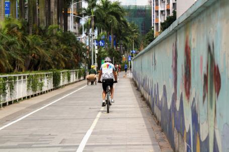 Man on bicycle in Shenzhen.