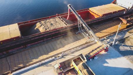 Grain is loaded onto a ship at a port in Ukraine
