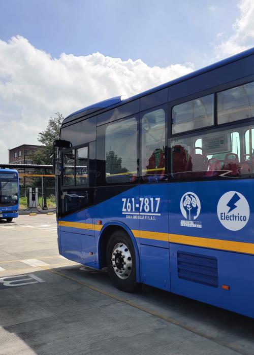 Transmilenio electric transit bus charging at an electric bus depot in Bogota, Colombia