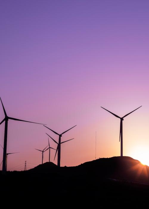 Wind turbines at sunset.